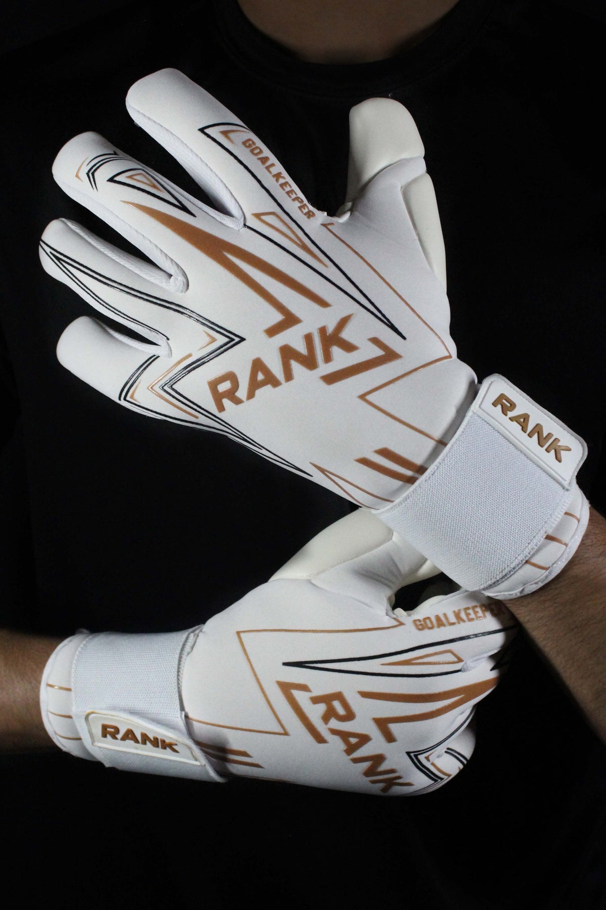 RANK Goalkeeping NOVA white and gold goalkeeper gloves, pair worn on hands – www.rankgoalkeeping.com
