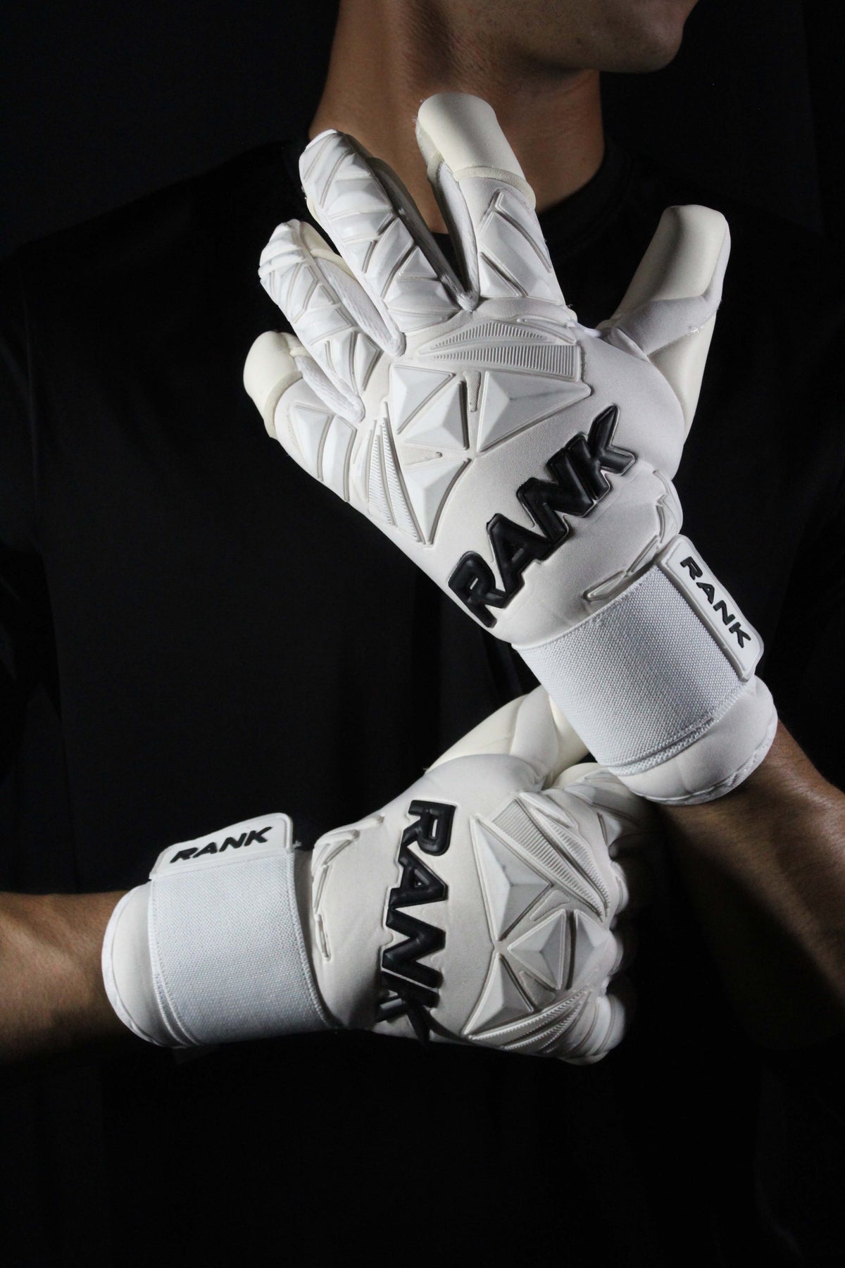 RANK Goalkeeping GHOST white goalkeeper gloves, pair worn on hands – www.rankgoalkeeping.com
